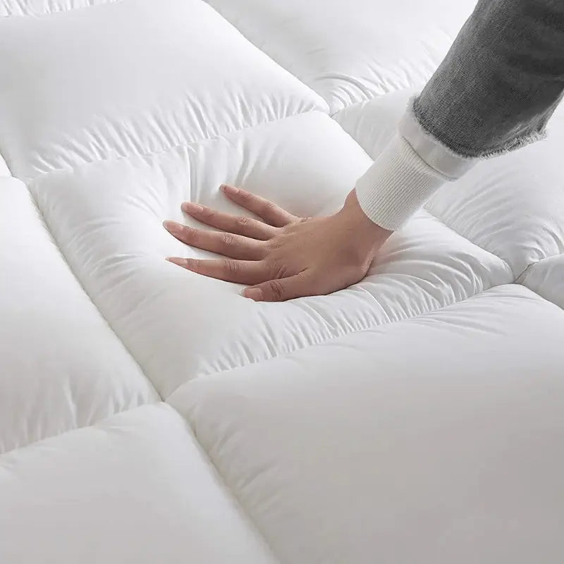 snuggi™ Mattress Topper